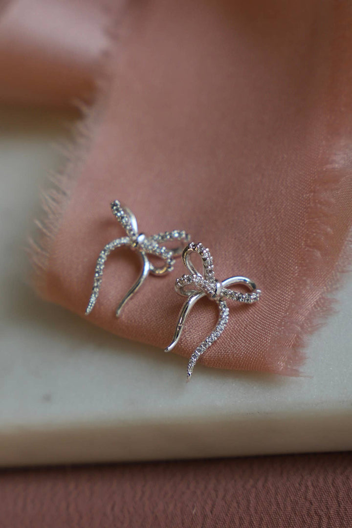 E1691S Silver Earrings-CZ Bow Studs