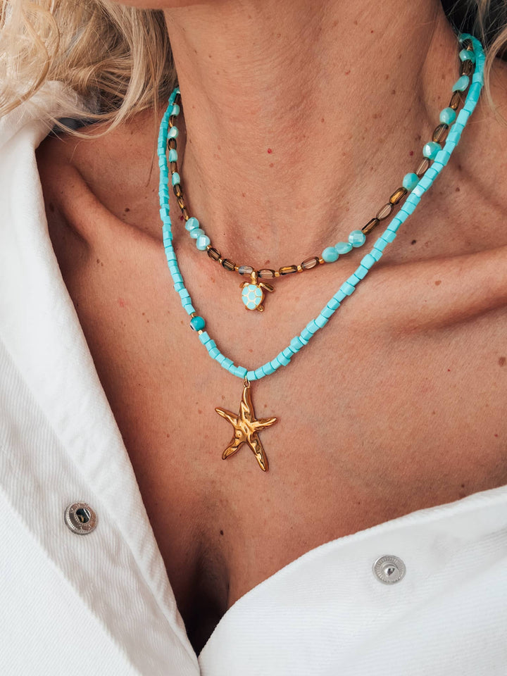 Necklace-Beaded with starfish and sea turtle gold charm
