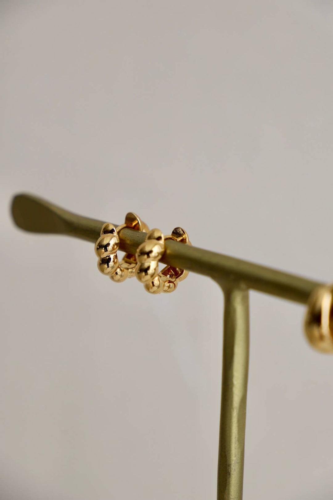 E1661G Gold Earrings-CROISSANT HUGGIE HOOP