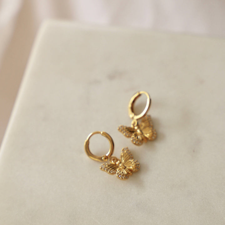 E1428G Gold Earrings-Butterfly Huggie Hoops