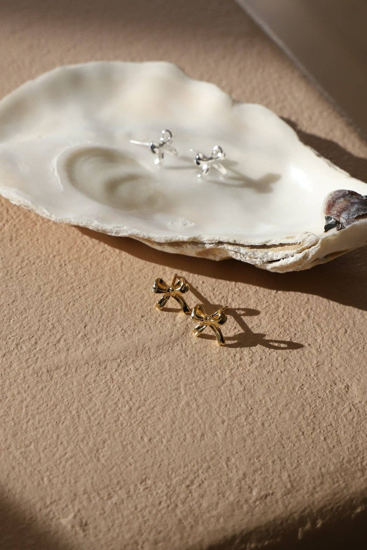 E1777 Gold Earrings-Petite Bow Studs