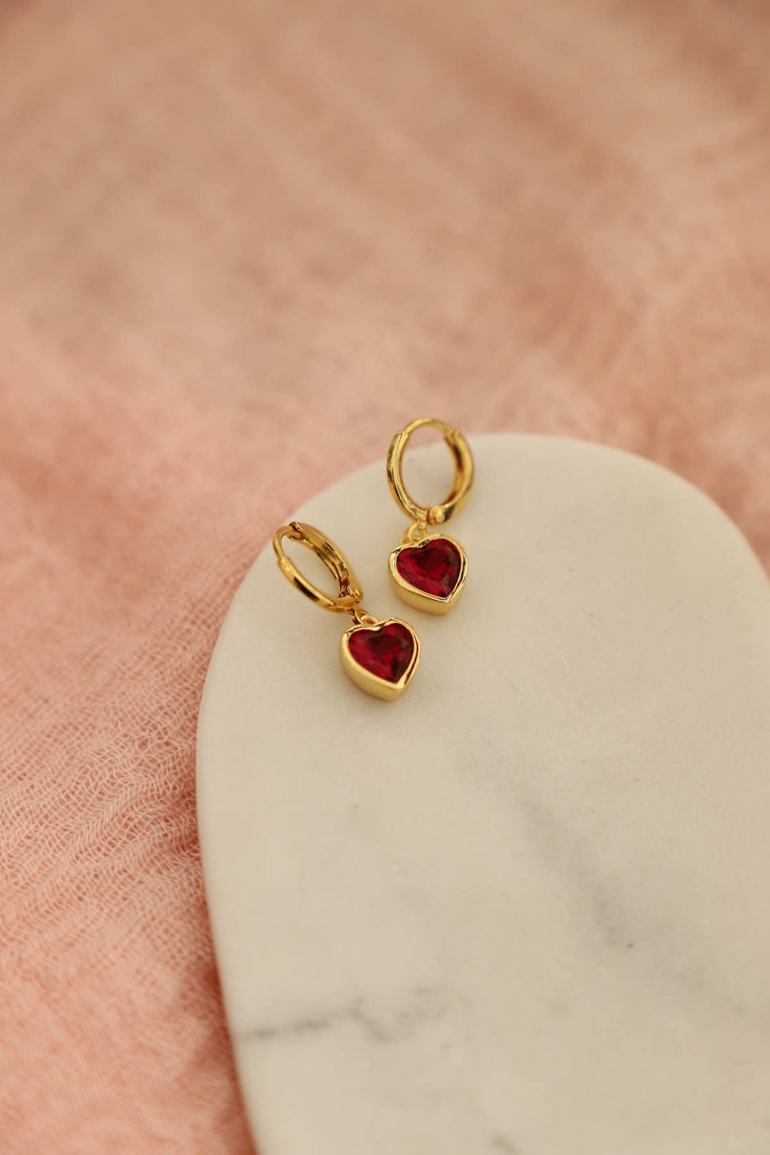 E1695G Gold Earrings-Ruby Heart Huggies