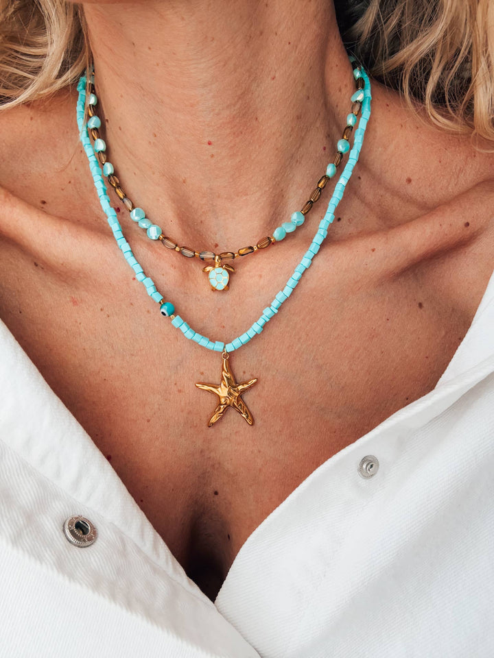 Necklace-Beaded with starfish and sea turtle gold charm