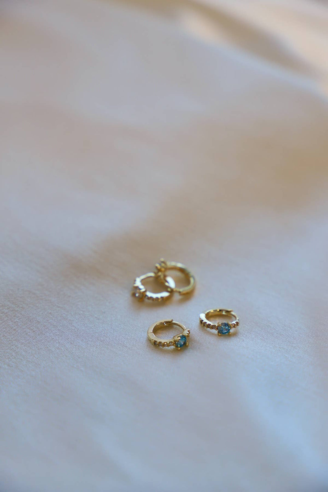 E1606AQUA Gold Earrings-Shine On Mini CZ Hoops Aqua