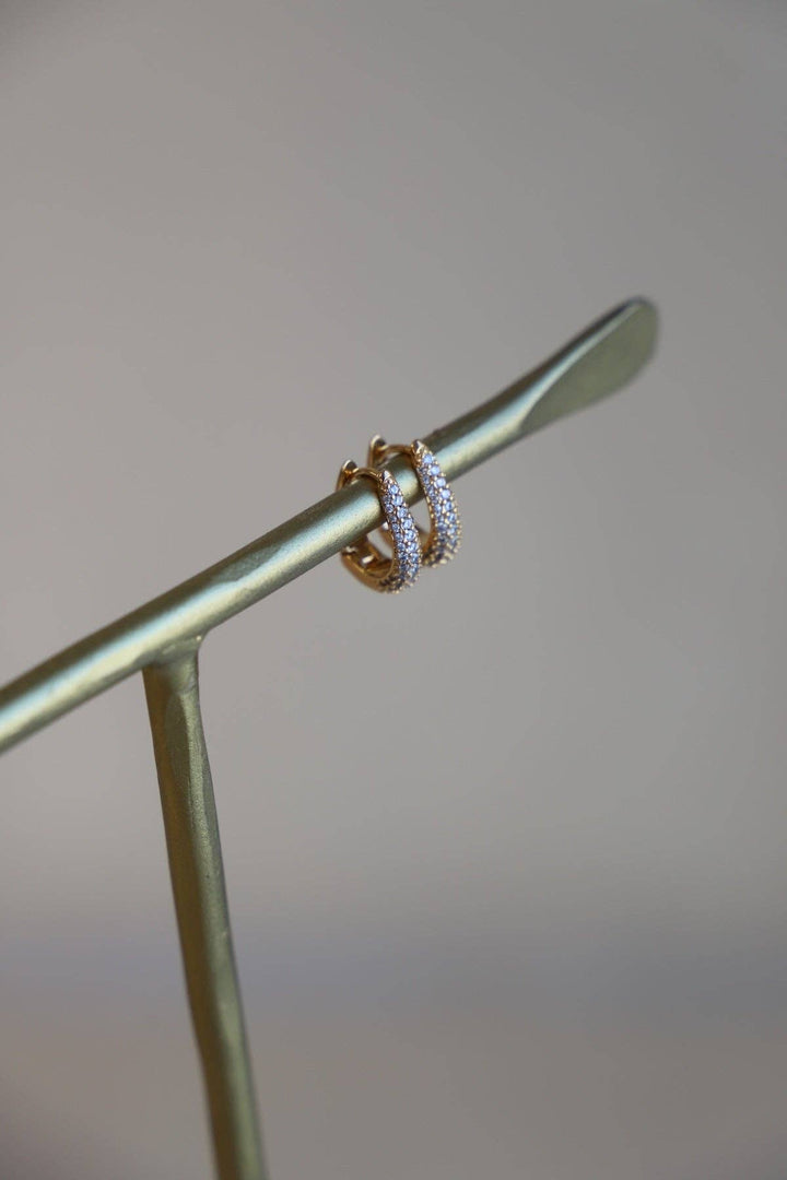 E1679 Gold Earrings-Oval CZ Huggie Hoops
