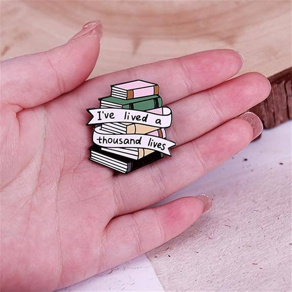 "I've Lived a Thousand Lives" Book Stack Enamel Pin