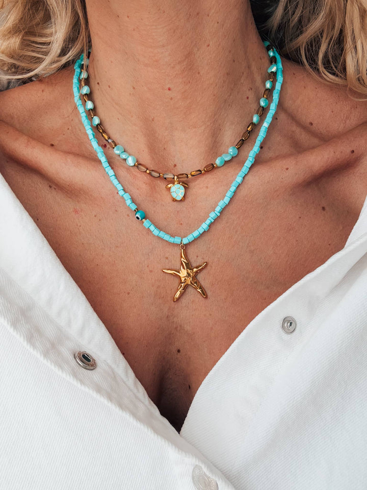 Necklace-Beaded with starfish and sea turtle gold charm