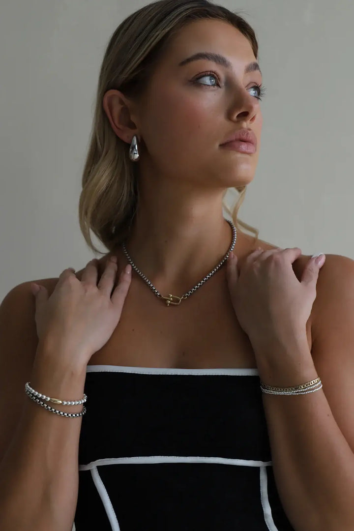 E1657S Silver Earrings-Gia Teardrop Stud